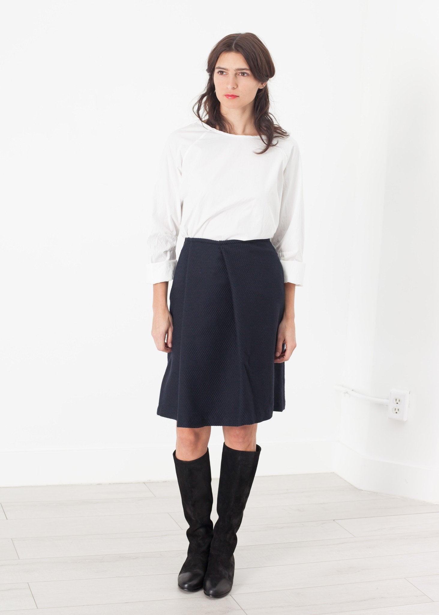Pleated Wool Skirt in Navy -nadeem