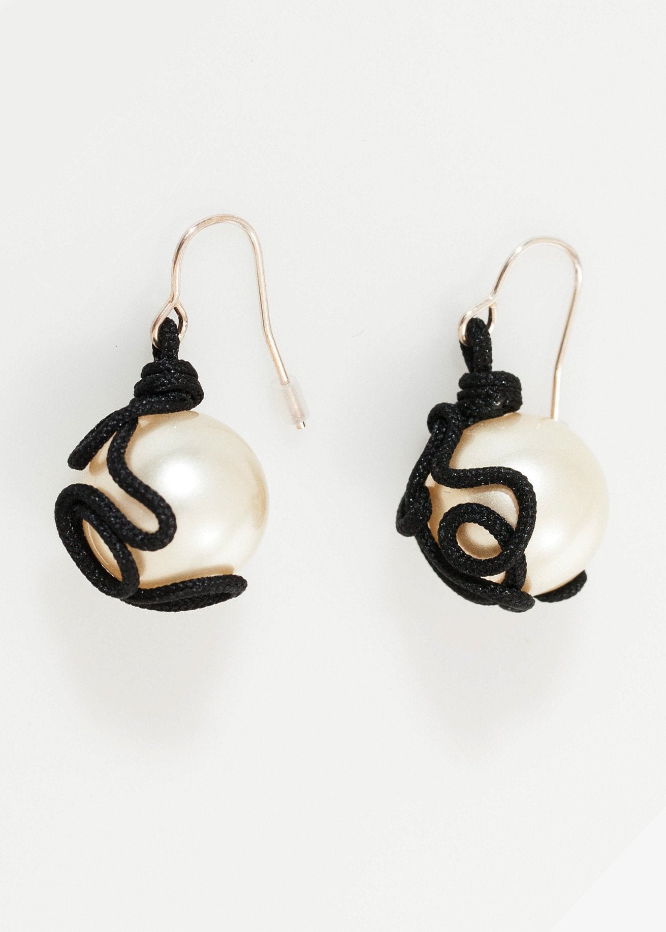 Float Bead Earring in Pearl right Float Bead Earring in Pearl